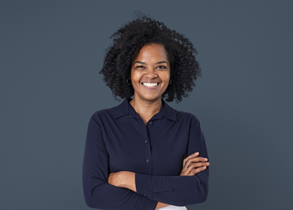 confident african businesswoman smiling closeup portrait for job